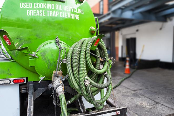 a service truck pumping grease from a restaurant's grease trap in Bexley OH